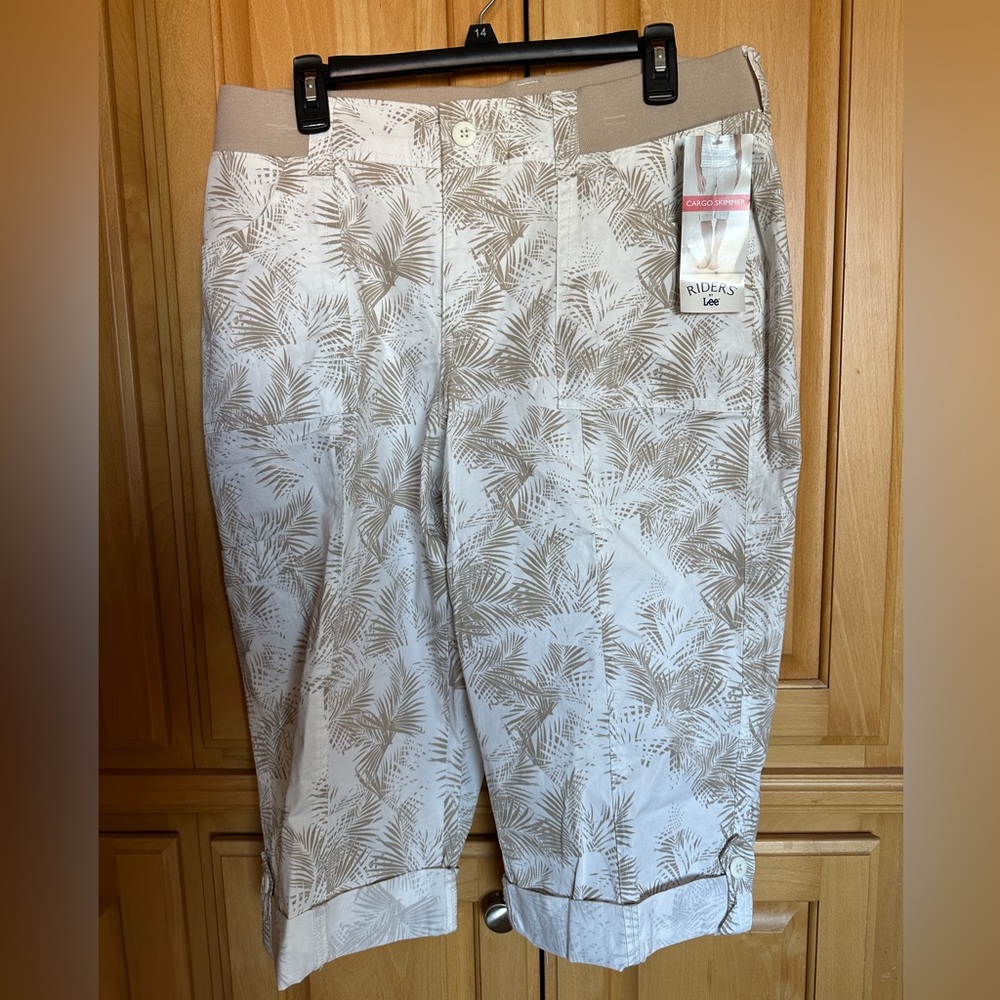 Beige and white never worn capri pants.